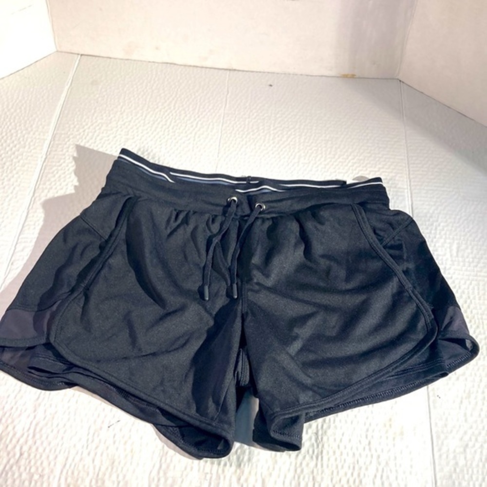 Woman’s Avia Black Fly Away Running Shorts
